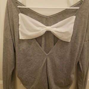 Gray shirt with open back and bow